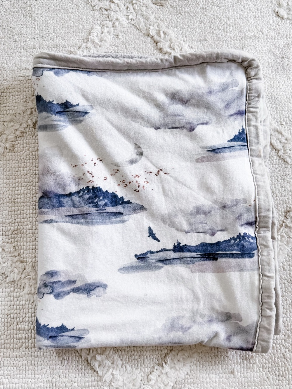 Oilo Studio White and Blue Watercolor Island Baby Throw
